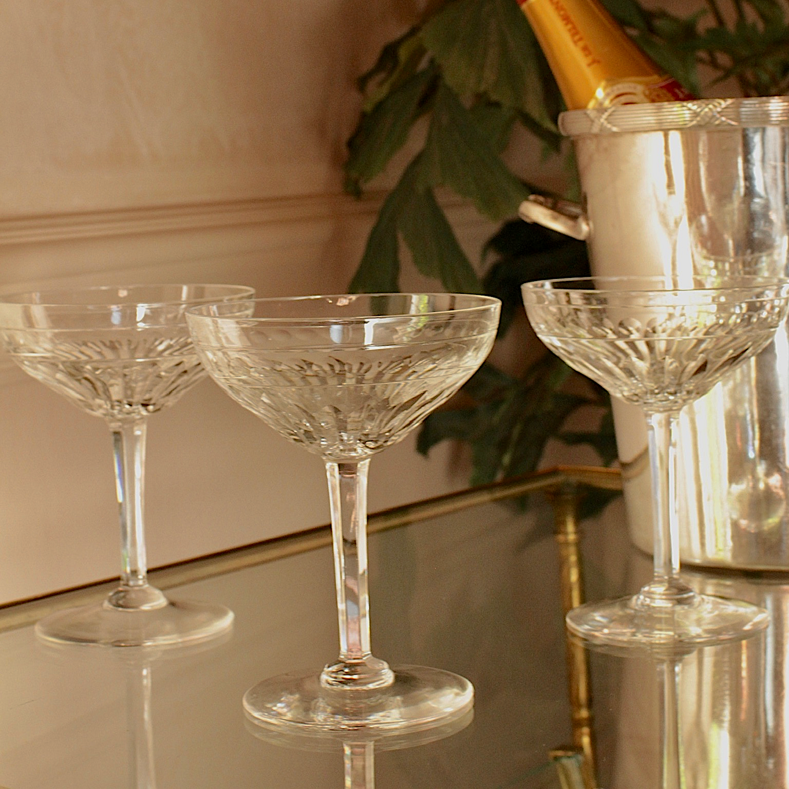 Beautiful vintage crystal champagne coupes with facet cut stems and cut glass design