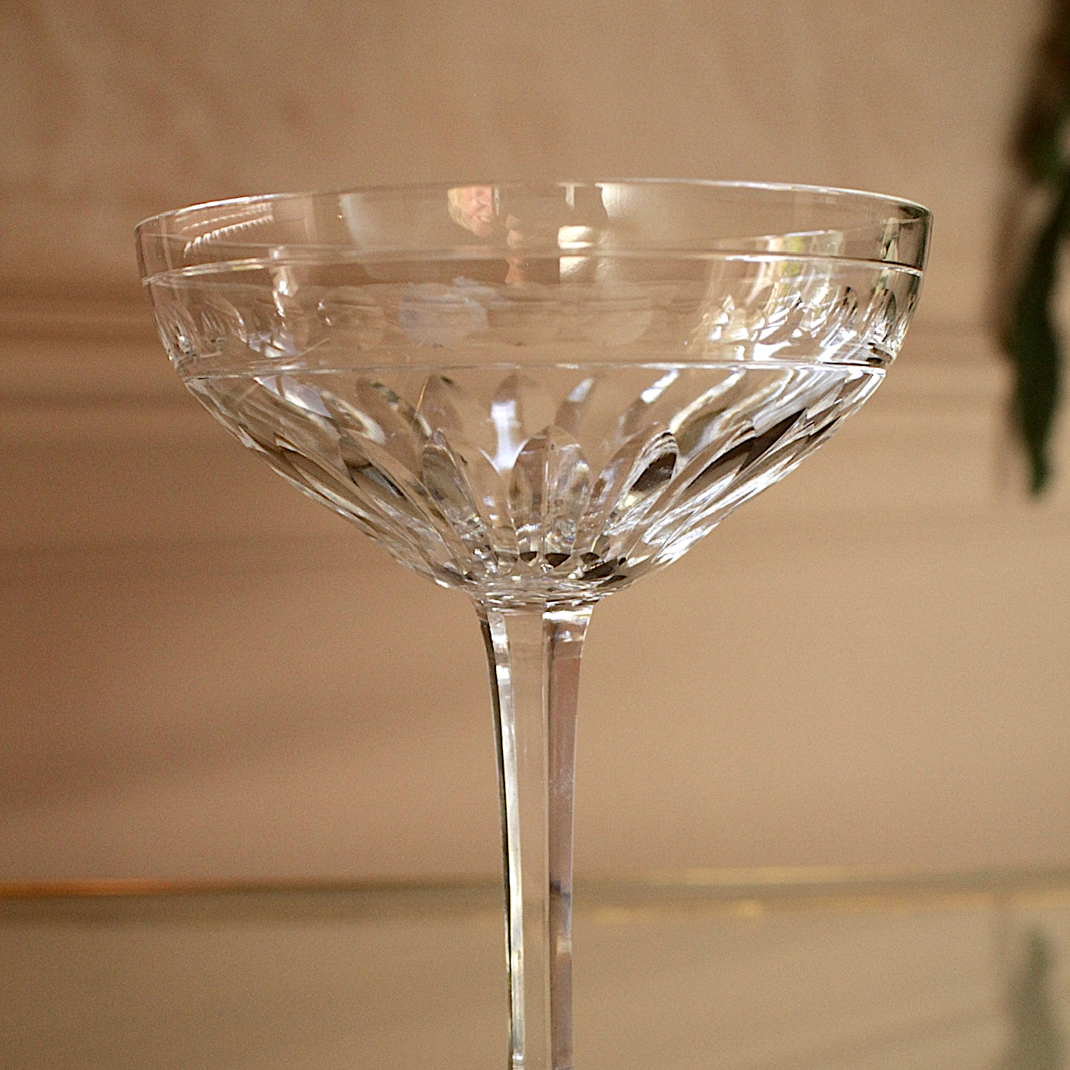 Beautiful vintage crystal champagne coupes with facet cut stems and cut glass design