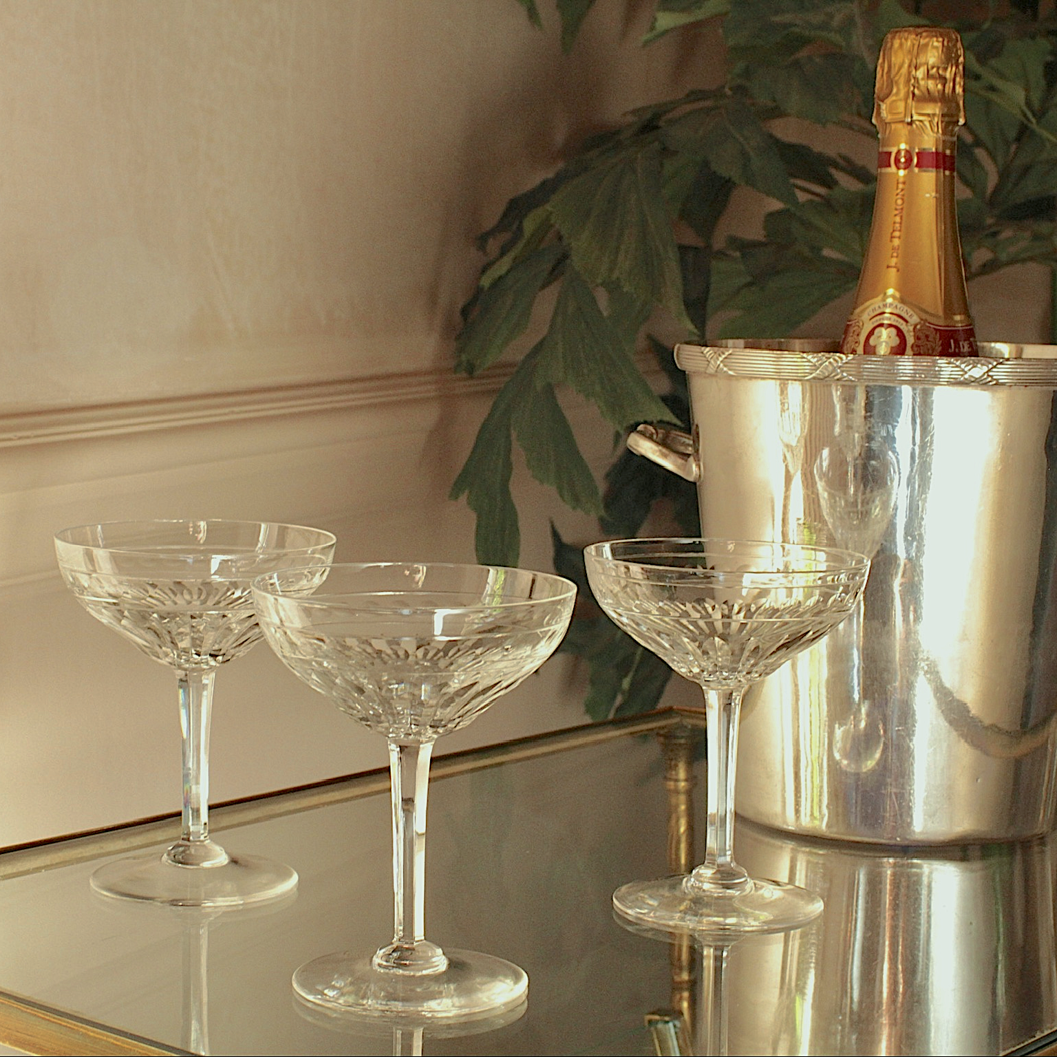 Beautiful vintage crystal champagne coupes with facet cut stems and cut glass design